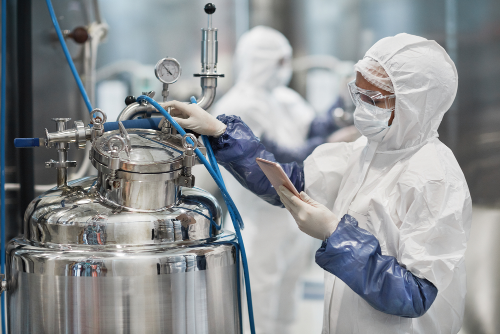 Woman working wearing a protective suit