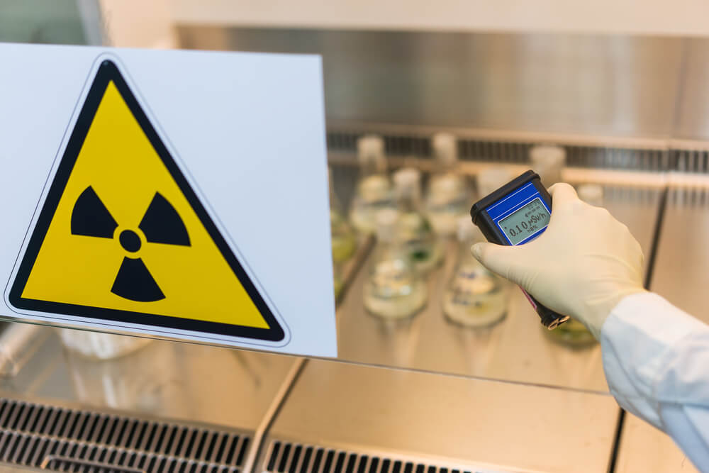 Supervisor checking radiation